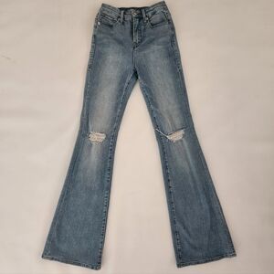 Good American Good Flare Denim Jeans with Distressed Knees